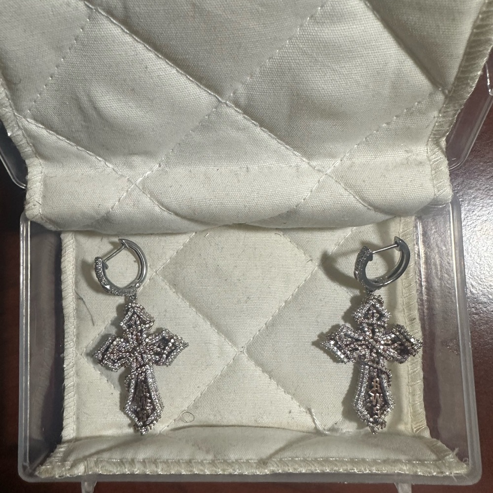 Iced out diamond cross earrings with purple gemstone